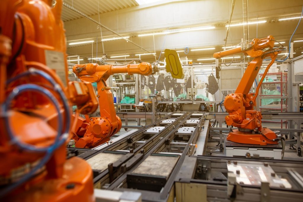 Home Automatic robots in the industrial factory for assembly automotive products, automotive concept